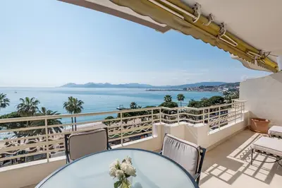 a view of the ocean from the balcony of a house at Buckingham & Lloyds - Cannes in Cannes