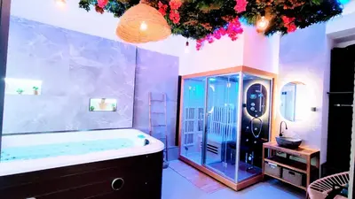 a large bathroom with a tub and a shower at KosyKasa SPA in Cannes
