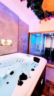 a jacuzzi tub in a room at KosyKasa SPA in Cannes
