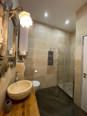 a bathroom with a sink and a shower at HEART OF OLD TOWN - BEACH 150m & PALAIS DES FESTIVALS 600m in Cannes