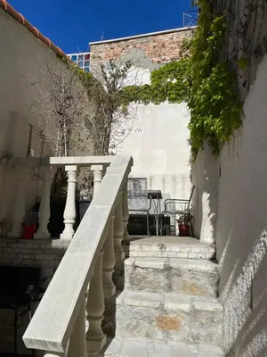 a set of stairs leading up to a building at HEART OF OLD TOWN - BEACH 150m & PALAIS DES FESTIVALS 600m in Cannes