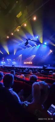 a crowd of people watching a show in a theatre at Cannes Croisette Suquet Duplex 4 P in Cannes