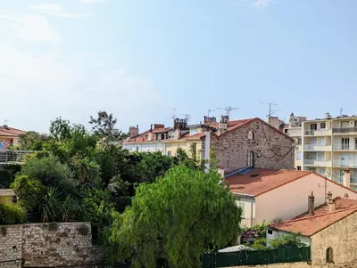 a view of a city with buildings and trees at Cannes Croisette Suquet Duplex 4 P in Cannes
