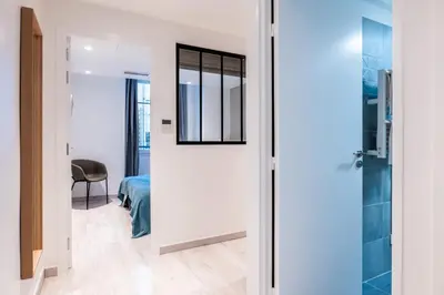 a room with a door leading to a bedroom at 1-Br apartment close to the beaches in Cannes