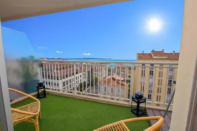 a balcony with a view of a building at Tulette in Cannes
