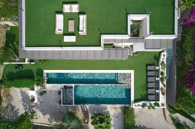 an aerial view of a house with a swimming pool at Cannes - Modern villa with 180° sea view in Vallauris