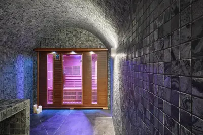 a room with a window in a brick wall at Cannes - Modern villa with 180° sea view in Vallauris