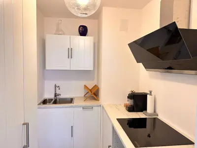 a kitchen with a sink and a stove at No.6 La Croisette in Cannes