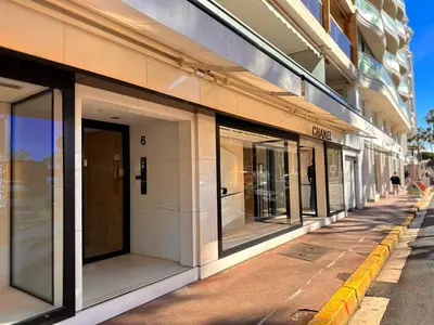 a row of windows on the side of a building at No.6 La Croisette in Cannes
