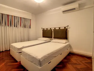 a bedroom with two beds with white sheets at 1 bedroom Latour Maubourg Cannes Riviera 245 in Cannes