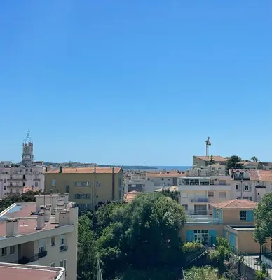 a view of a city with buildings at Cannes au Calme à 10 mn à pieds du centre, aperçue mer - Parking gratuit in Cannes