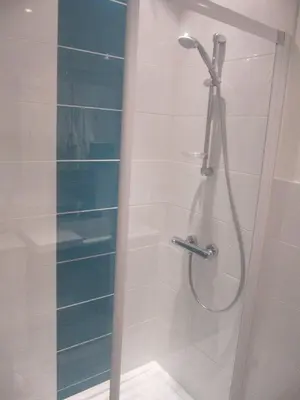 a shower with a glass door in a bathroom at Centre et plage tout à pied échappée mer in Cannes
