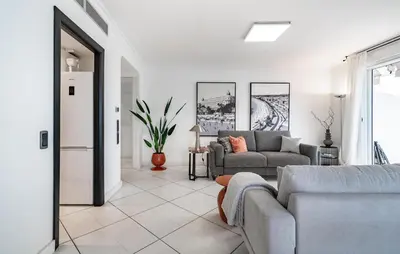 a living room with two couches and a couch at 2 Bedroom Cozy Apartment In Cannes in Cannes
