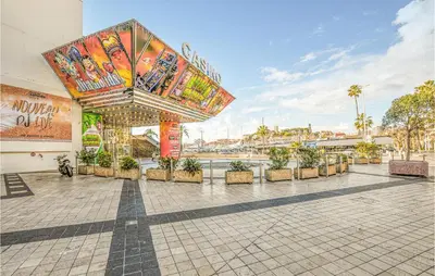 a building with a large sign on top of it at 2 Bedroom Cozy Apartment In Cannes in Cannes