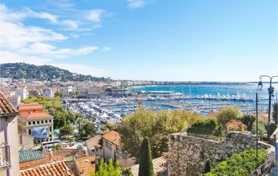 a view of a city with boats in the water at 2 Bedroom Cozy Apartment In Cannes in Cannes