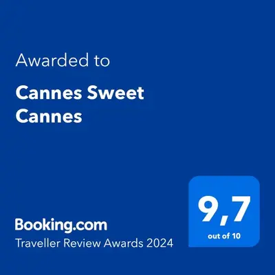 a blue screen with the text awarded to games sweet games at Cannes Sweet Cannes in Cannes