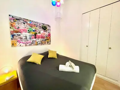 a bedroom with a large bed with two towels at Marina Luxury 3 bedroom by Welcome to Cannes in Cannes