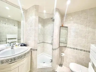 a bathroom with a sink and a shower at Marina Luxury 3 bedroom by Welcome to Cannes in Cannes