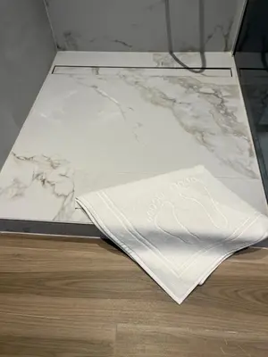a white towel sitting on top of a counter at Parc Montfleury in Cannes