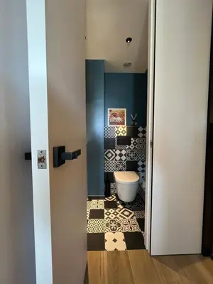 a bathroom with a tub and a toilet in a room at Parc Montfleury in Cannes