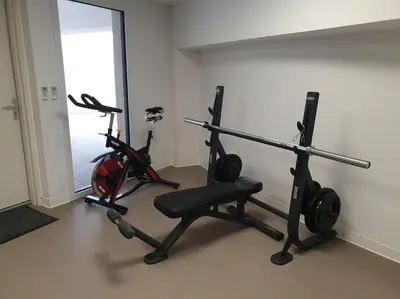 a gym with two exercise bikes in a room at Horizon Bay - Pool - Fitness Room - Terrace in Cannes