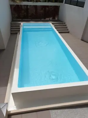 a large blue swimming pool in a building at Horizon Bay - Pool - Fitness Room - Terrace in Cannes