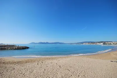a view of a beach with the ocean at CROISETTE AZUR ONE BEDROOM APARTMENT WITH TERRACE in Cannes